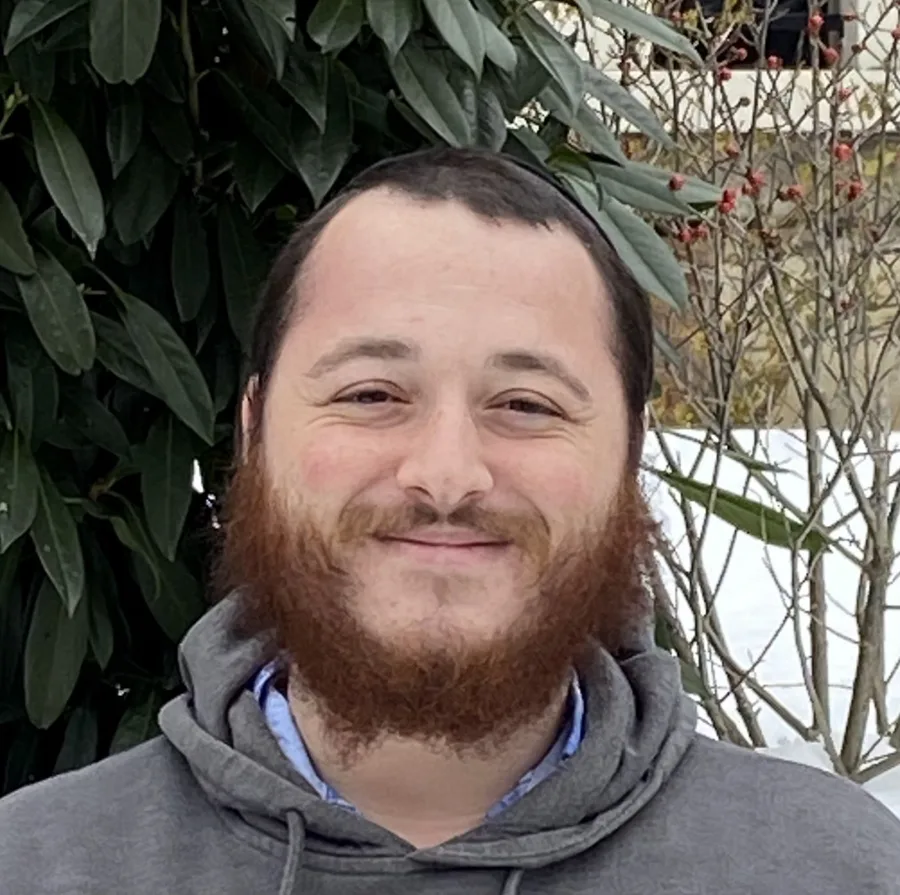 Matis Fogel smiling outdoors